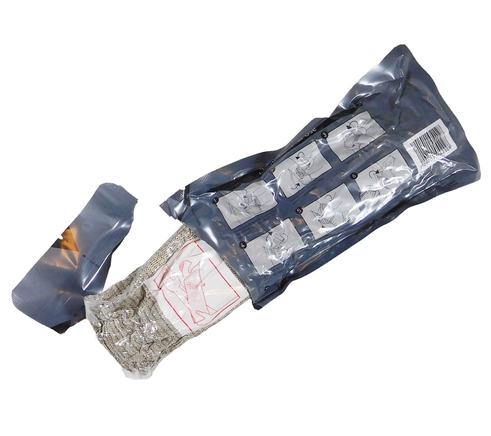 Opening an Israeli Bandage to see the sterile trauma wound dressing inside.
