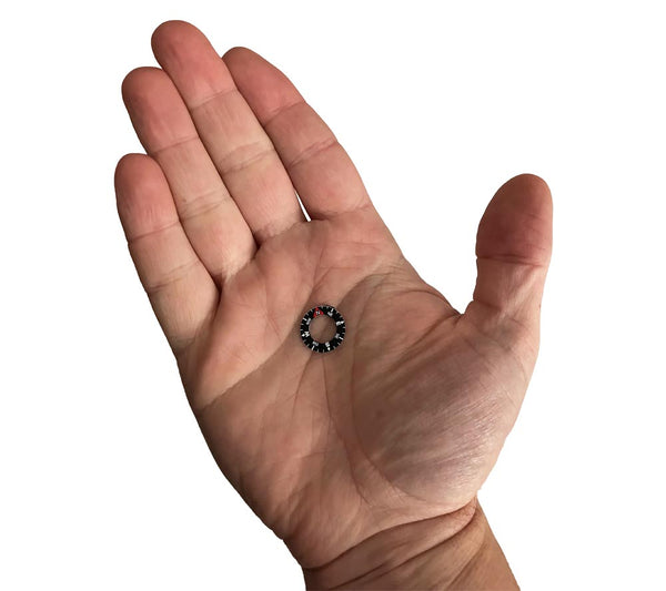 This miniature floating compass dial is the size of a fingertip and fits in the palm of your hand.