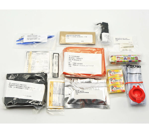 The General Purpose Module NSN: 6545-00-152-1578 contains a MIL-B-36964 Type 3 Casualty Blanket, Mosquito Headnet/Mittens, Signal Mirror, Water Storage Bag, Wire Flex Saw, and more.