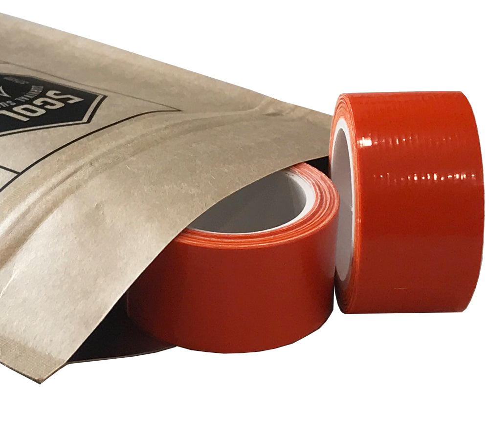 Orange miniature duct tape rolls with a 1 in. width and 100 in. length on a plastic core for fast, easy use.