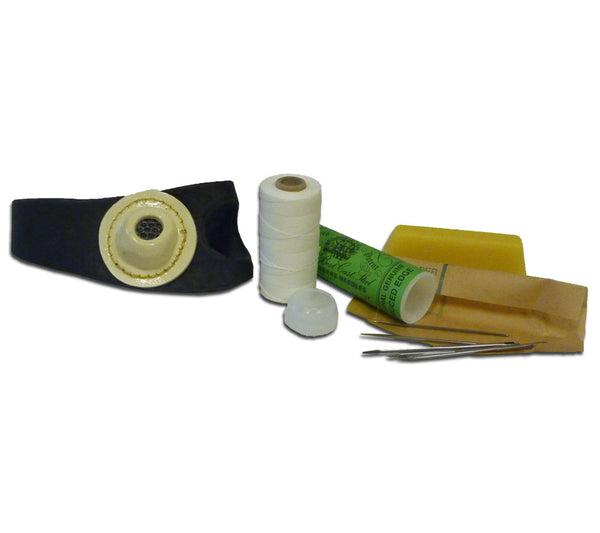 Kit contains 1 oz. spool of 5-ply twine, beeswax right-handed sailmaker sewing palm, and 5 Sailmakers' needles.