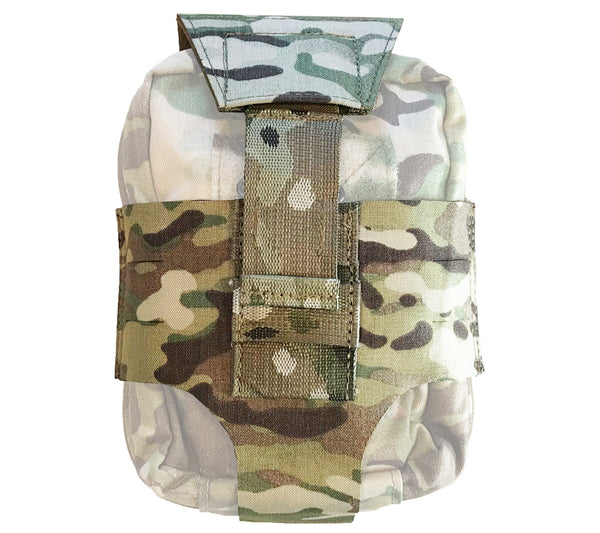 The Med Pouch Thong from FirstSpear allows for rapid deployment of first aid kits and survival kit pouches from a fixed PALS or MOLLE base, as in a vehicle or large pack.