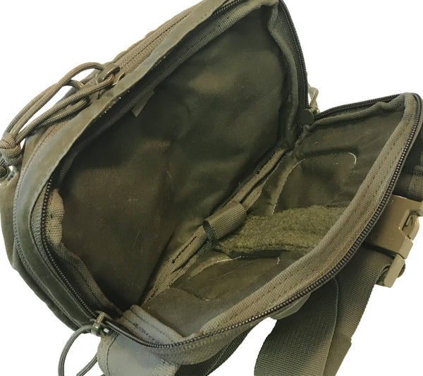 The Belt Pack's pistol compartment has a dummy loop and loop panel for minimalist holsters and retention systems.